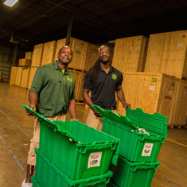 Professional packers with eco-crammers at The Green Truck Moving & Storage Company